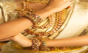 Gold-Plated Silver Temple Jewellery and Yellow Bridal Saree for a Timeless Wedding Look